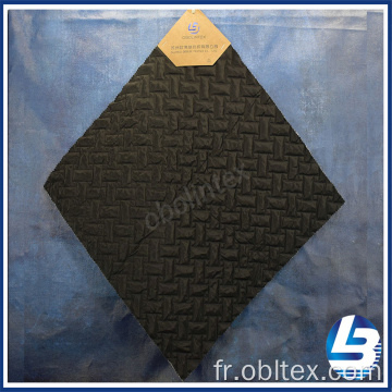 Tissu de mémoire en polyester obl20-Q-043 pour couche de quilting